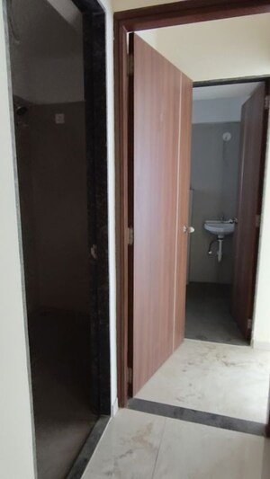 Building Lobby in 2 BHK Apartment at Triumph Omkareshwar CHS, Borivali East – for Rent