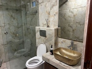 Bathroom in 3.5 BHK Builder Floor at Ansal Sushant Lok I, Sector 43 – for Rent