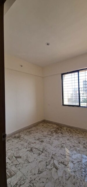 Room in 2 BHK Apartment at Nexus Shree Residency, Chikhali – for Rent