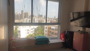 Living Room in 1 BHK Apartment at Charkop Gaon – for Sale