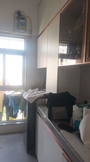 Living Room in 1 BHK Apartment at Charkop Gaon – for Sale