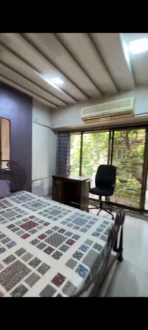 Bedroom in 3 BHK Apartment at Gajanan CHS, Kandivali West – for Rent