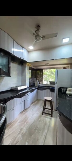 Kitchen in 3 BHK Apartment at Gajanan CHS, Kandivali West – for Rent