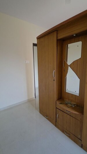 Bedroom in 2 BHK Apartment at Shree Tirupati STG Signature Residency, Patlipada – for Rent