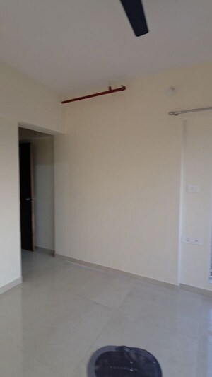 Master Bedroom in 2 BHK Apartment at Shree Tirupati STG Signature Residency, Patlipada – for Rent