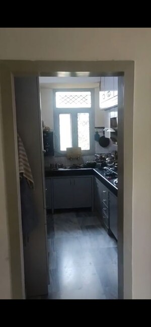 Kitchen in 3 BHK Apartment at Samridhi CGHS Apartments, Sector 21c – for Sale