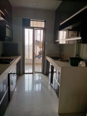 Kitchen in 2 BHK Apartment at Lodha Aqua, Mira Road – for Sale