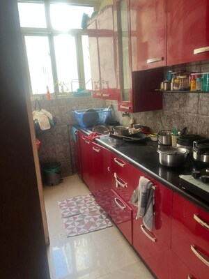 Kitchen in 2 BHK Apartment at Aditya Urban Casa, Sector 78 – for Rent