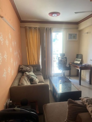 Living Room in 2 BHK Apartment at Aditya Urban Casa, Sector 78 – for Rent