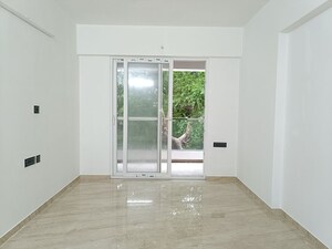 Living Room in 2 BHK Apartment at Cosmo Suvidhi Apartment, Yerawada – for Rent