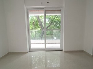 Bedroom in 2 BHK Apartment at Cosmo Suvidhi Apartment, Yerawada – for Rent
