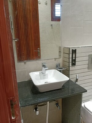 Bathroom in 2 BHK Builder Floor at Model Town – for Rent