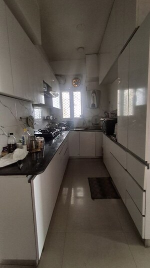 Kitchen in 2.5 BHK Apartment at Aims Golf City, Sector 75 – for Rent