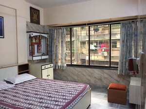 Bedroom in 2 BHK Apartment at Dhaval Sunrise Charkop, Kandivali West – for Rent