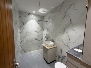 Bathroom in 4 BHK Builder Floor at Green Fields Colony – for Sale