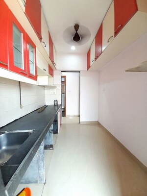 Kitchen in 1 BHK Apartment at DB Parkwoods, Kasarvadavali – for Sale
