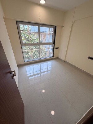 Room in 2 BHK Apartment at Pratham ARC Aura, Andheri West – for Rent