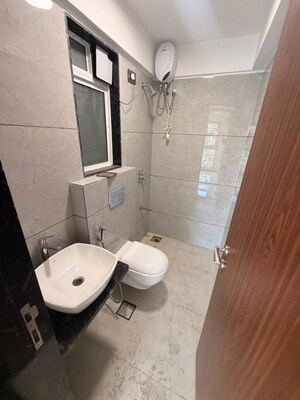 Bathroom in 2 BHK Apartment at Pratham ARC Aura, Andheri West – for Rent