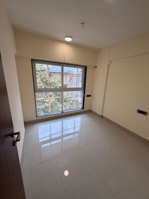 Room in 2 BHK Apartment at Pratham ARC Aura, Andheri West – for Rent