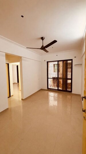 Room in 1 BHK Apartment at Swaraj Symphony CHS, Kharghar Sector 10 – for Sale