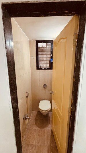 Bathroom in 1 BHK Apartment at Swaraj Symphony CHS, Kharghar Sector 10 – for Sale