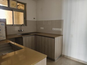 Kitchen in 2 BHK Apartment at Hiranandani Estate Pelican, Ghodbunder Road – for Rent