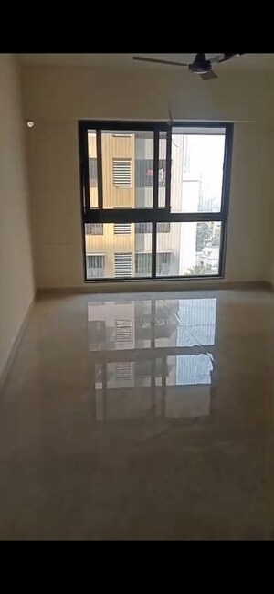 Room in 1 BHK Apartment at Ajmera Boulevard, Malad West – for Rent