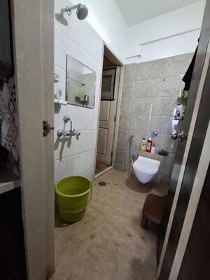Bathroom in 1 BHK Apartment at Vijay Galaxy, Waghbil – for Rent