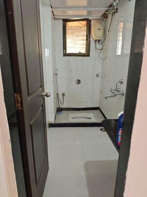 Bathroom in 2 BHK Apartment at Sudarshan Sky Garden, Ghodbunder Road – for Rent
