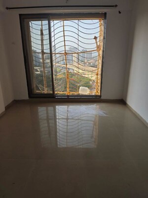 Room in 2 BHK Apartment at Sudarshan Sky Garden, Ghodbunder Road – for Rent