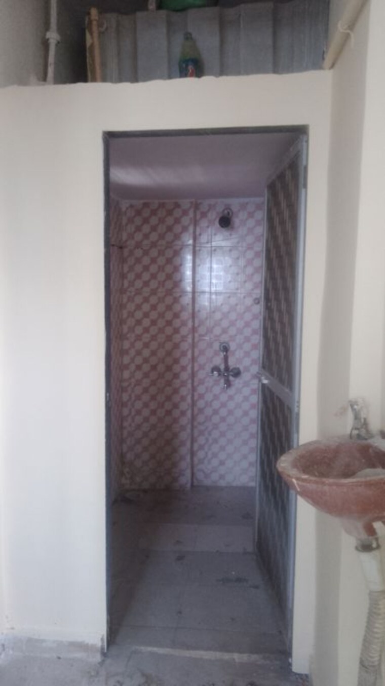 Bathroom, abhidarshan-homes 1 Bedroom 600 Sq.Ft. Apartment In Titwala Thane 10430770