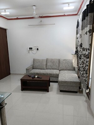Living Room in 2 BHK Apartment at Runwal Eirene, Balkum Pada – for Rent