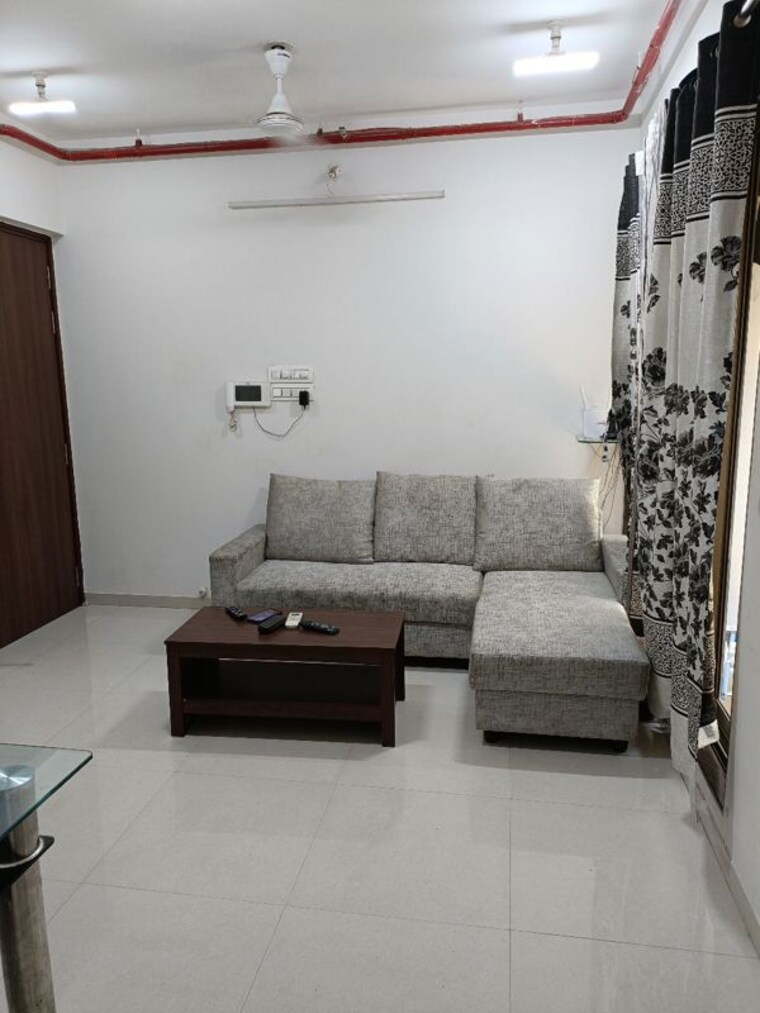Living Room, runwal-eirene 2 Bedroom 650 Sq.Ft. Apartment In Balkum Pada Thane 10430790