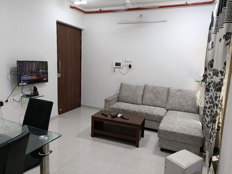 Living Room, runwal-eirene 2 Bedroom 650 Sq.Ft. Apartment In Balkum Pada Thane 10430790