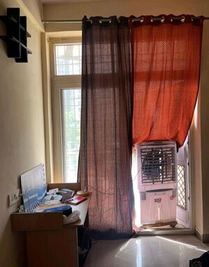 Living Room in 2 BHK Apartment at AVJ Heightss, Zeta I Greater Noida – for Sale
