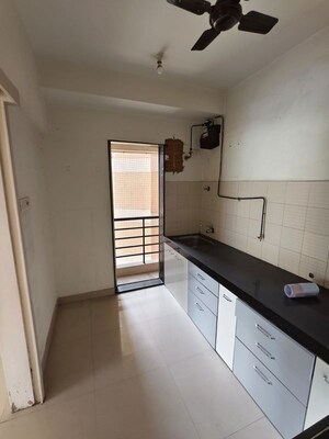 Kitchen in 3 BHK Apartment at DB Parkwoods, Kasarvadavali – for Sale
