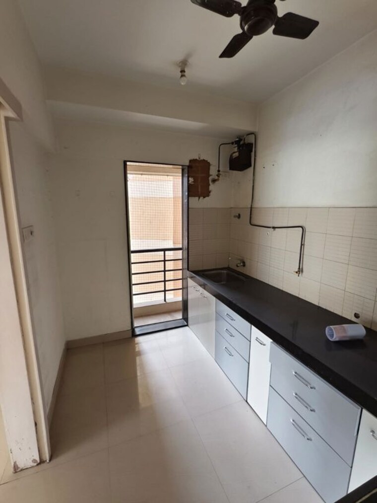 Kitchen, db-parkwoods 3 Bedroom 1000 Sq.Ft. Apartment In Kasarvadavali Thane 10430857