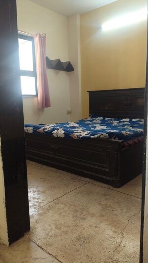 Bedroom in 2 BHK Apartment at K Raheja Heights, Malad East – for Rent
