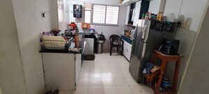 Kitchen in 2 BHK Apartment at Taneshq Jewel, Thergaon – for Rent