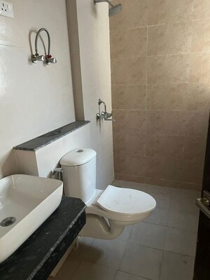 Bathroom in 2 BHK Apartment at Nirala Greenshire, Sector 2 Greater Noida – for Rent