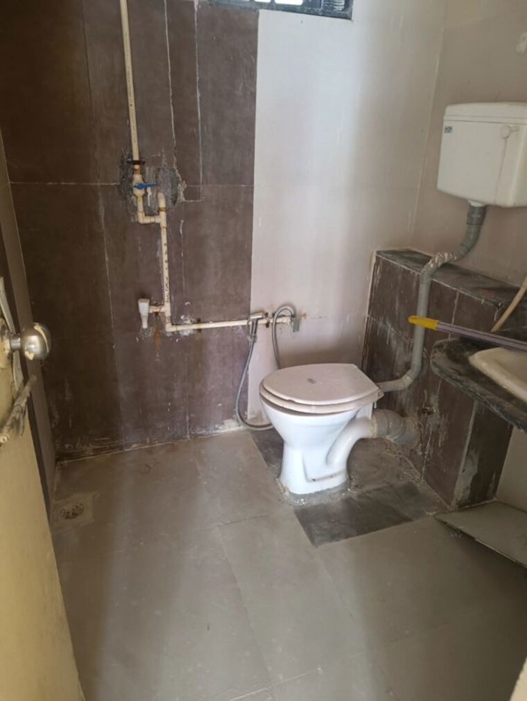 Bathroom, satellite 2 Bedroom 250 Sq.Ft. Apartment In Satellite Ahmedabad 10430963