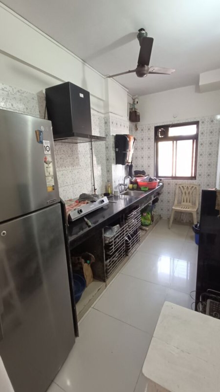 Kitchen, prem-sagar-chs-andheri 2 Bedroom 698 Sq.Ft. Apartment In Andheri West Mumbai 10431003