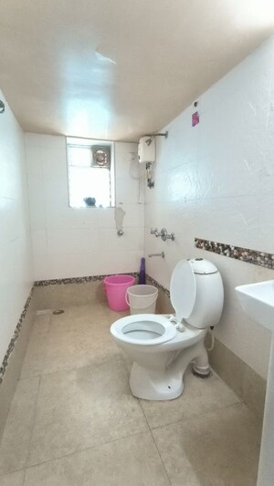 Bathroom in 4 BHK Apartment at Joshi Vadi – for Rent