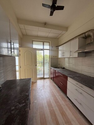 Kitchen in 4 BHK Apartment at Ansal Sushant Golf City Celebrity Greens, Sushant Golf City – for Rent