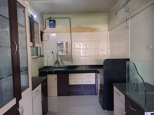 Kitchen in 2 BHK Apartment at Pimple Saudagar – for Sale