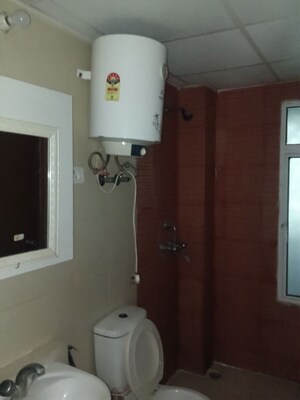 Bathroom in 3 BHK Apartment at Mahagun Mywoods, Sector 16c Greater Noida – for Rent