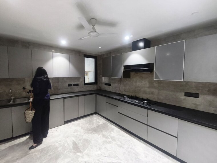Kitchen, anand lok 4 Bedroom 400 Sq.Yd. Builder Floor In Anand Lok Delhi 10431145