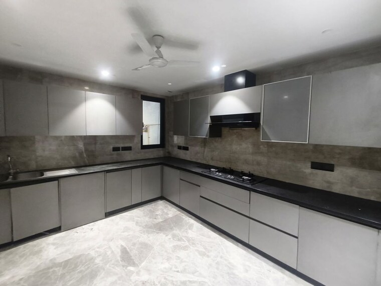 Kitchen, anand lok 4 Bedroom 400 Sq.Yd. Builder Floor In Anand Lok Delhi 10431145