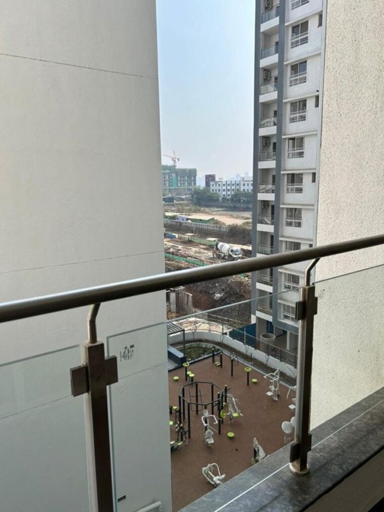 Balcony, gera-world-of-joy 2.5 Bedroom 1100 Sq.Ft. Apartment In Kharadi Pune 10431083