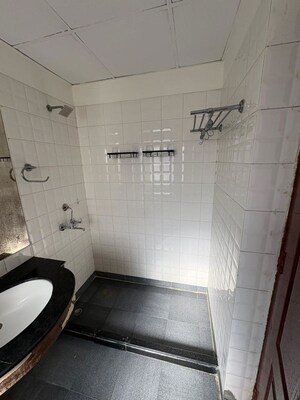 Bathroom in 3.5 BHK Apartment at Orchid Petals, Sector 49 – for Sale